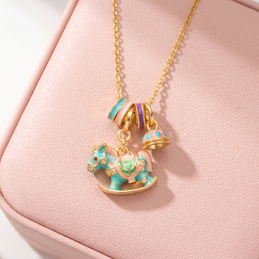 Enamel Carousel Rocking Horse Blue Pink Charm Bell Pendant Necklace | Gold | Luxe4543