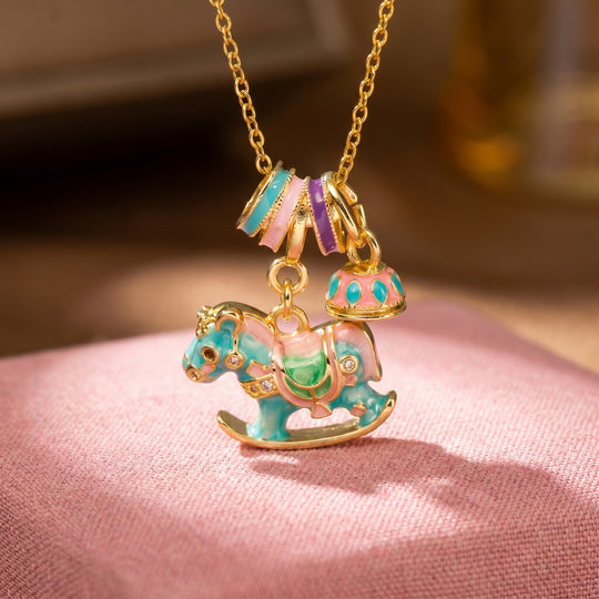 Enamel Carousel Rocking Horse Blue Pink Charm Bell Pendant Necklace | Gold | Luxe4543