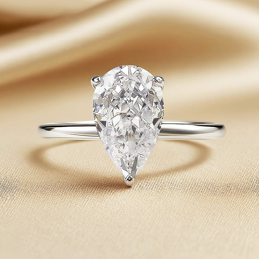 Prm7128: The Moissanite Pear Perfection Solitaire Ring