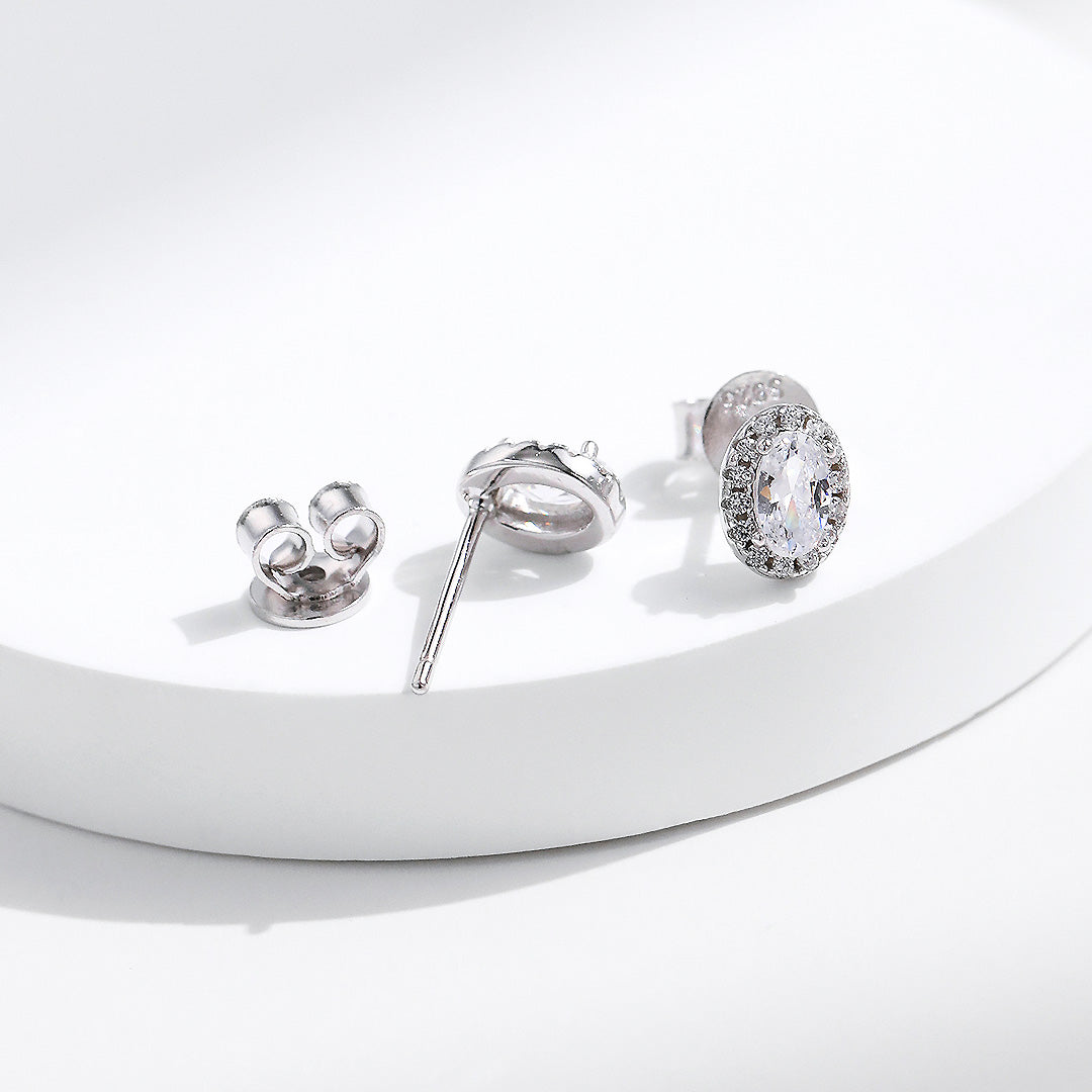 Prm8114: The Oval Halo Stud Earrings