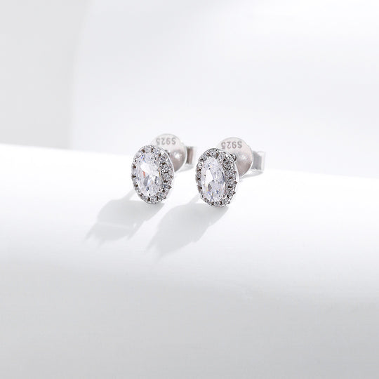 Prm8114: The Oval Halo Stud Earrings
