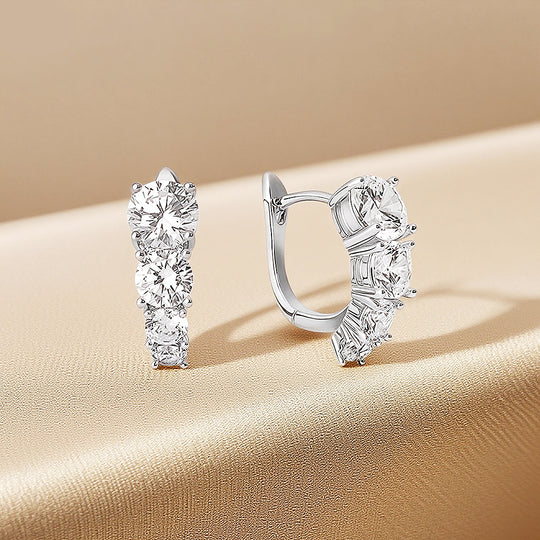Prm8122: The Moissanite Graduated Cluster Huggie Hoops