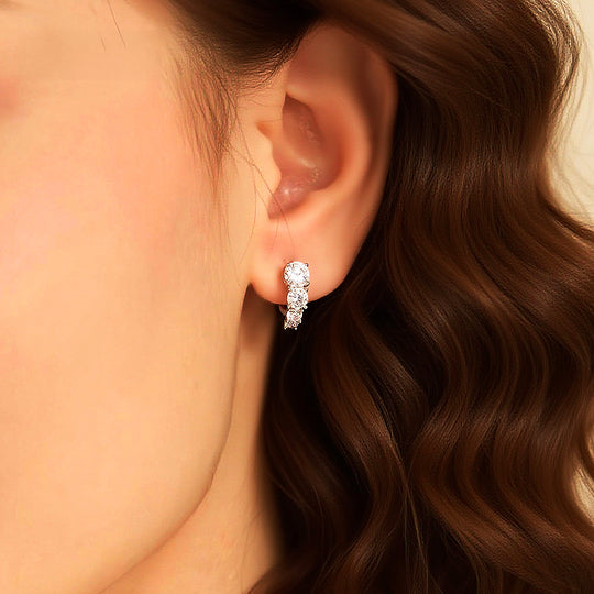 Prm8122: The Moissanite Graduated Cluster Huggie Hoops