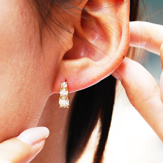 Prm8124: The Moissanite Graduated Cascade Stud Earrings