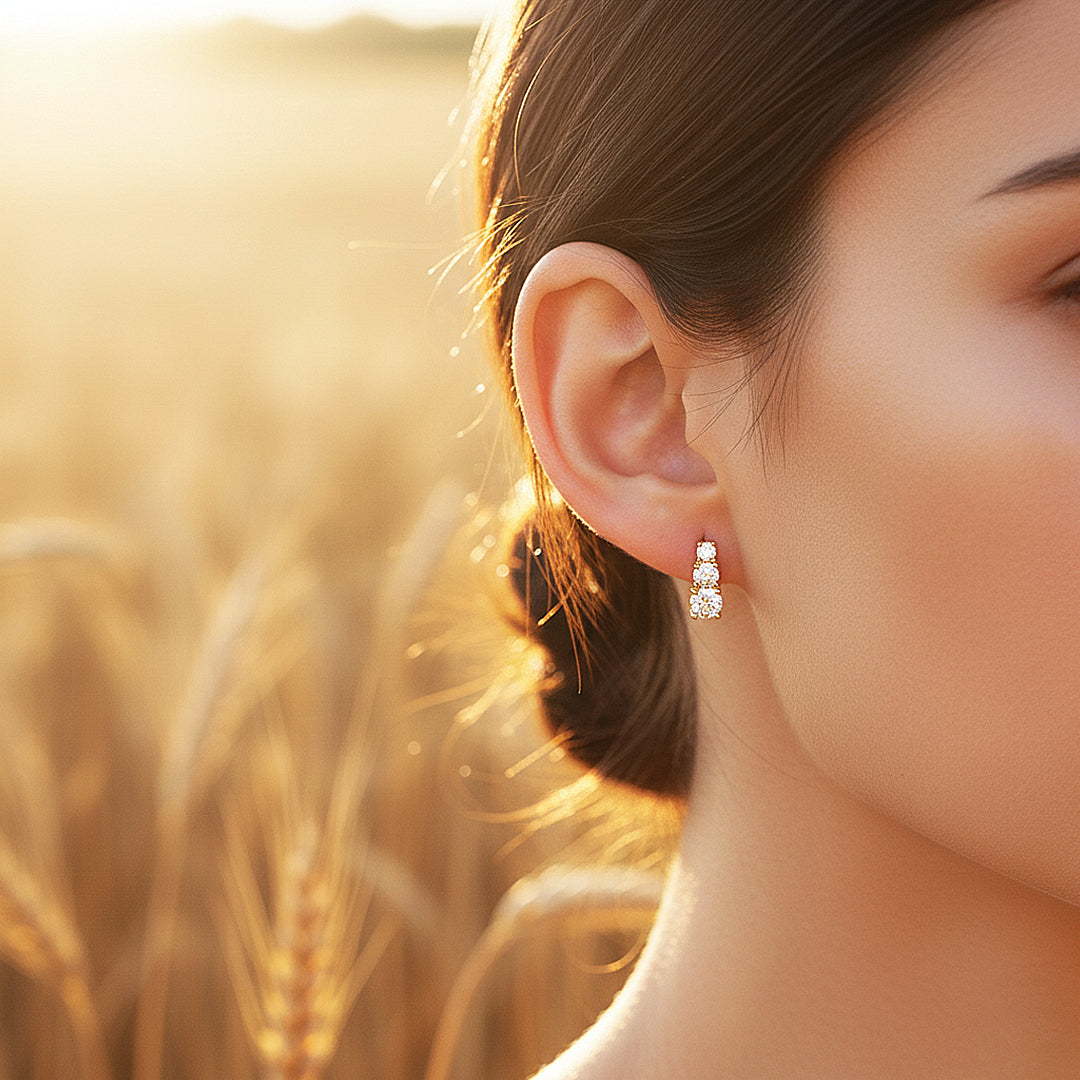 Graduated Triple Solitaire Stud Earrings | Moissanite | 14K Gold Plated 925 Sterling Silver | Prm8124