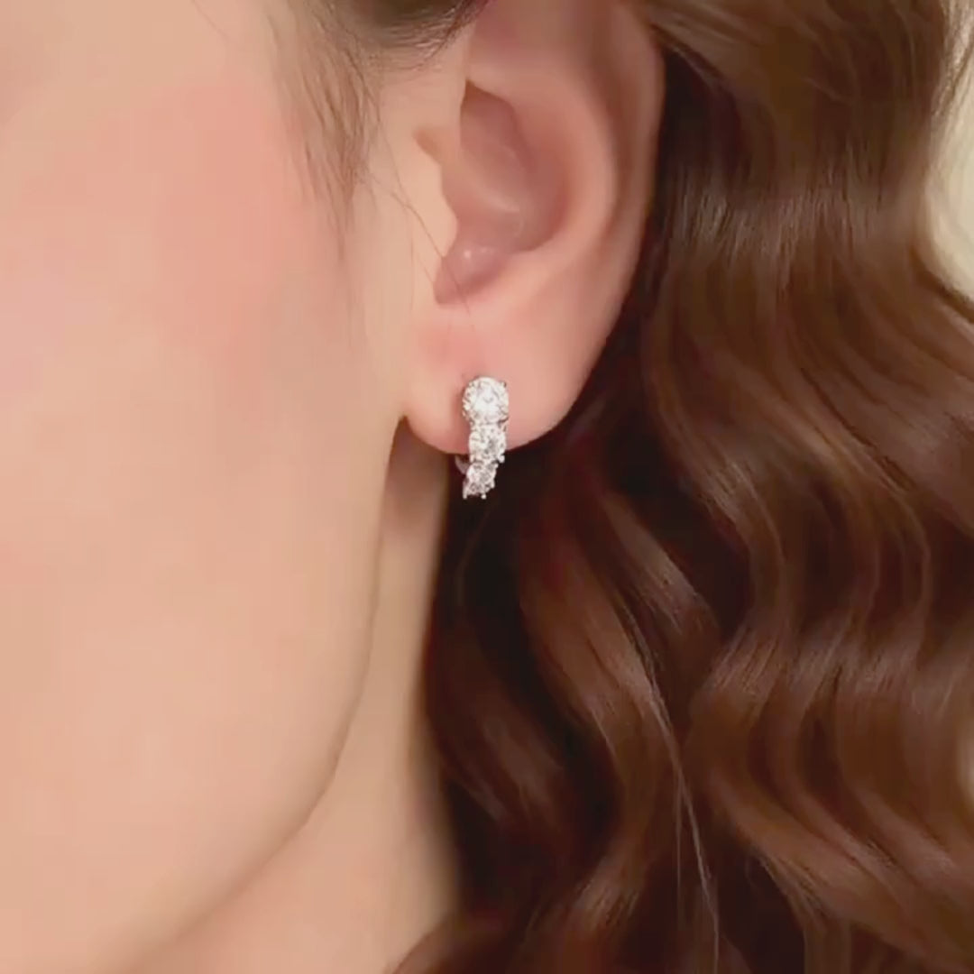 Prm8122: The Moissanite Graduated Cluster Huggie Hoops